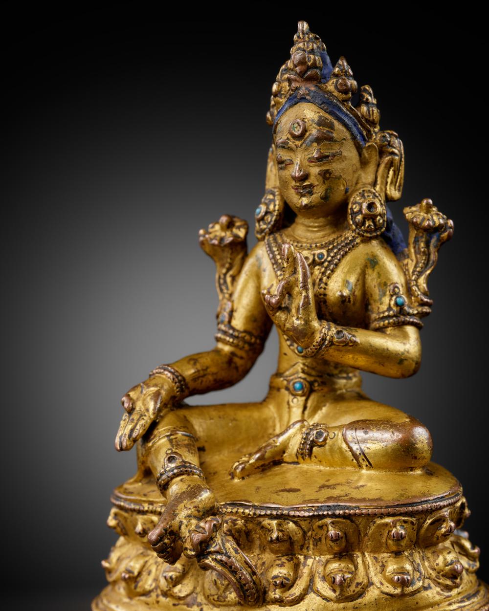 A GILT-BRONZE FIGURE OF GREEN TARA, TIBET, 16TH-17TH CENTURY sold by Galerie Zacke, lot 9 — auction record photograph