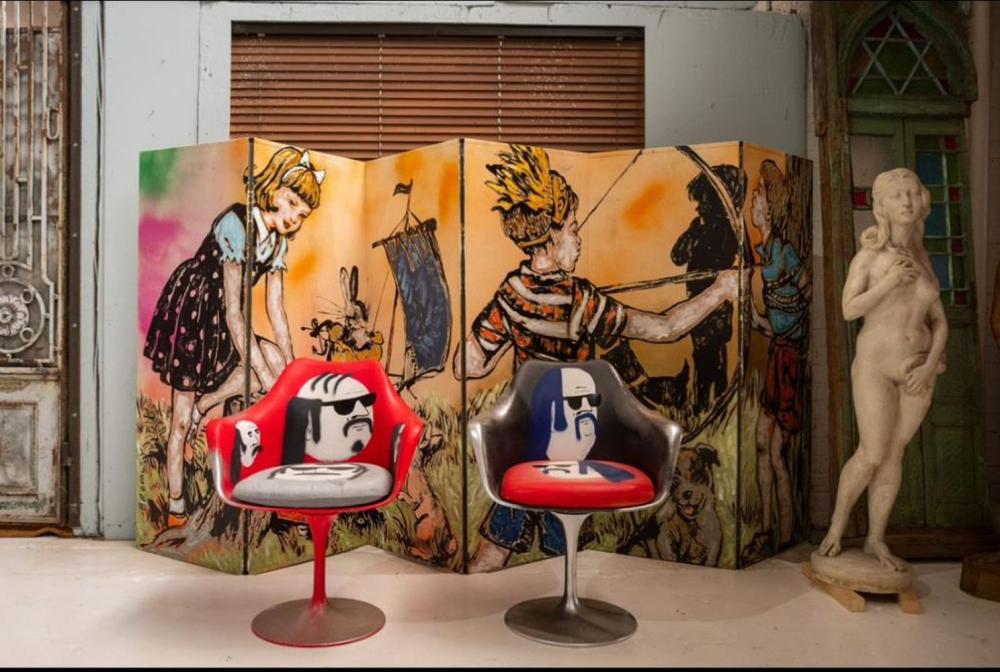 Tom Gerrard comparable auction result: 2 tulip style chairs painted by tom gerrard