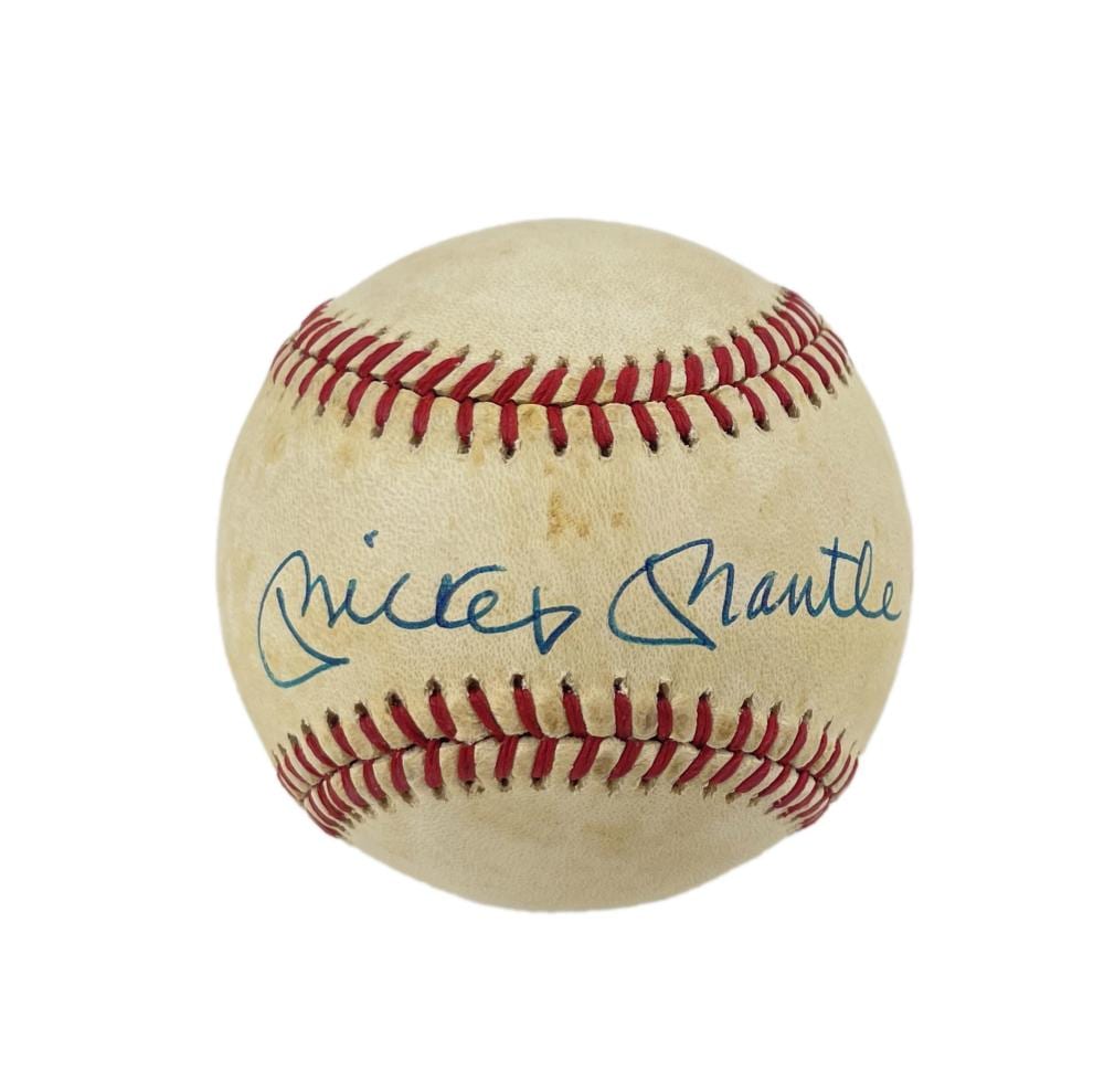 Off-white baseball with red stitching and a blue handwritten signature across the center.