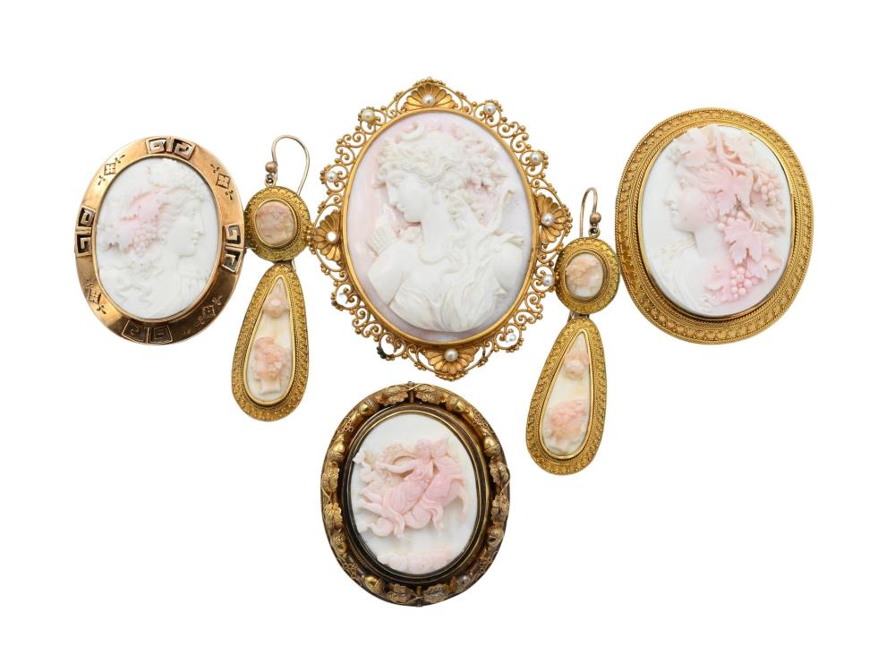 Six Piece Lot of Victorian Coral Cameos, in elaborate Victorian gold frame having shells and small pearls, 19th century, 2 3/8" x 2 3/4", two coral carved cameos one of a maiden riding a serpent, one of a woman in pro... sold by Nadeau's Auction Gallery, lot 250 — auction record photograph