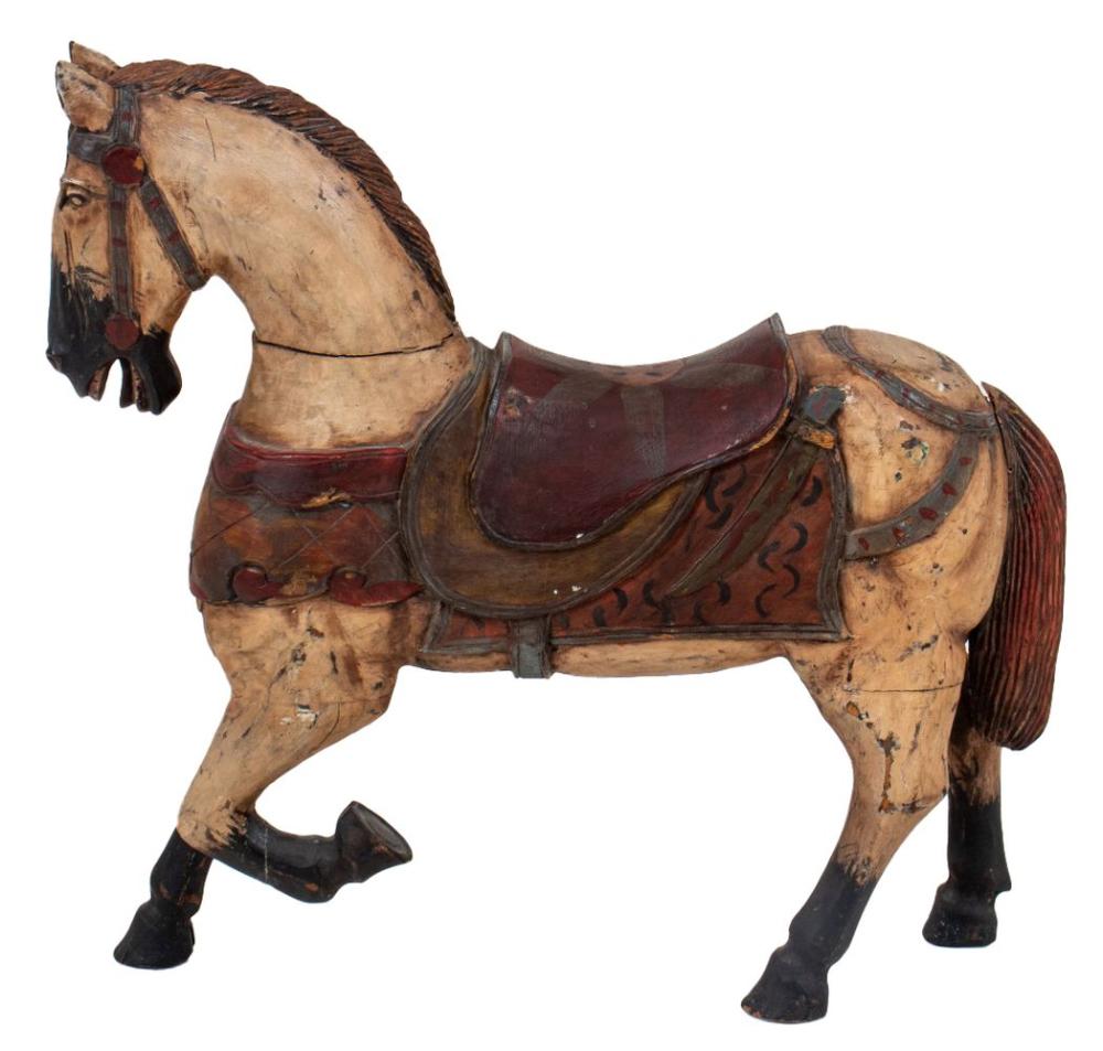 Small painted carousel horse figure on a white background with a dark mane and maroon saddle.