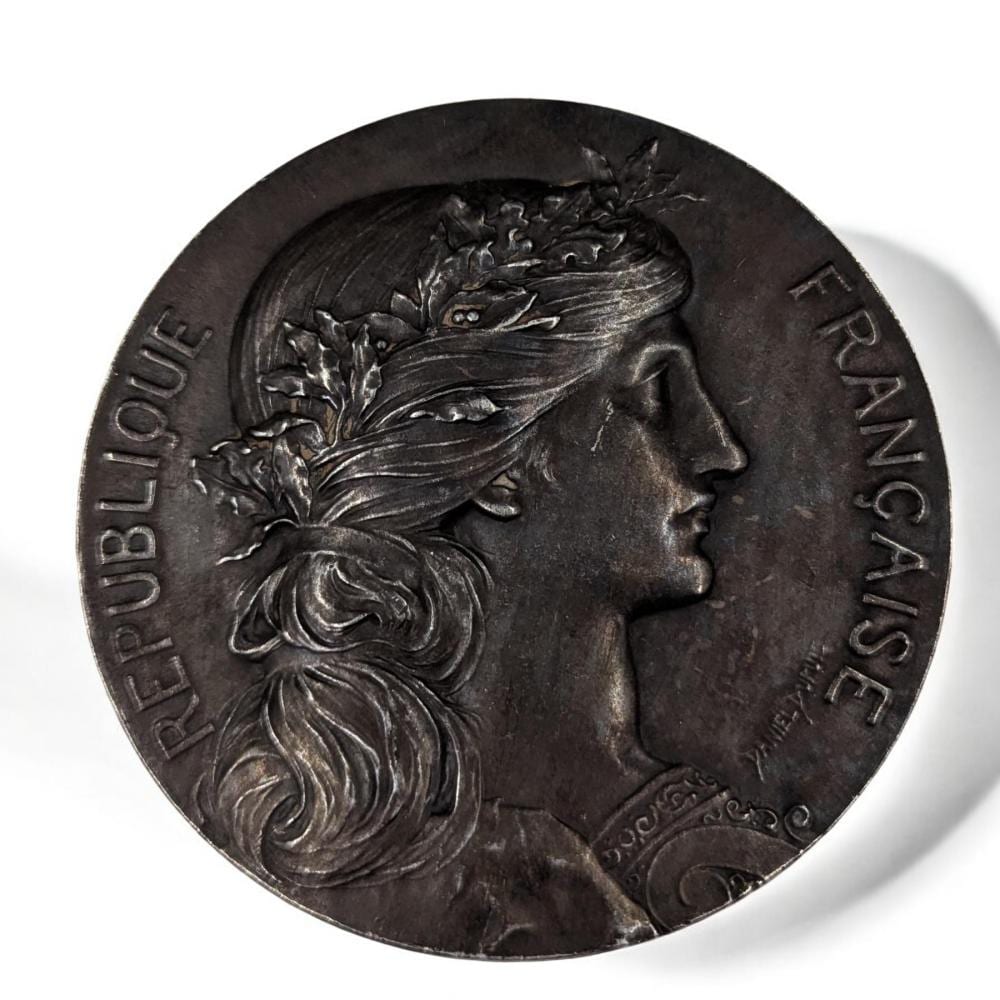Daniel Dupuis comparable auction result: a vintage french bronze award medal of marianne republique francaise 1919 by daniel dupuis