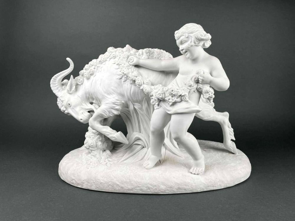Armand Godard comparable auction result: armand godard child playing with goat bisque sculpture