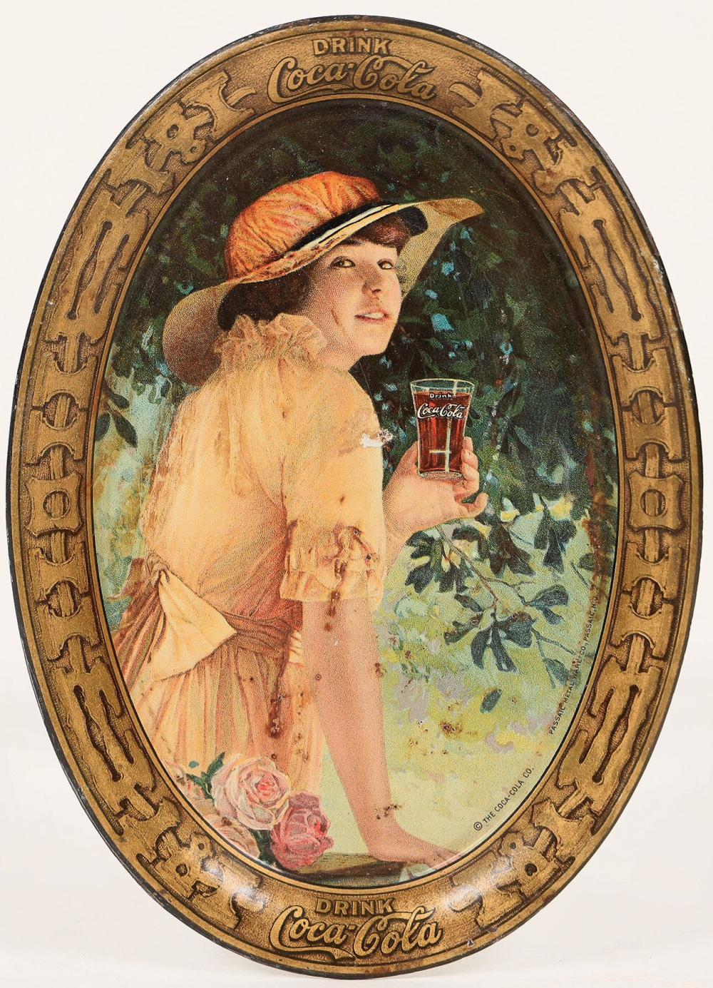 Round Coca-Cola tin lithograph tip tray featuring a woman in a hat holding a Coca-Cola can and surrounded by flowers.