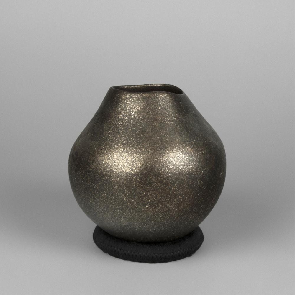 Lonnie Vigil comparable auction result: lonnie vigil micaceous blackware vase ca 2000