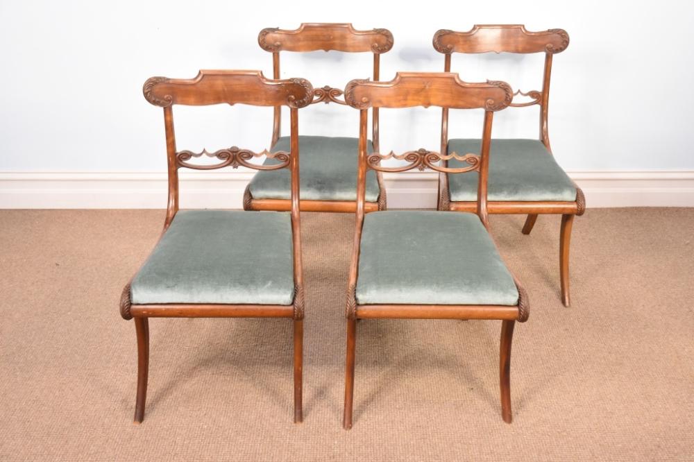 A fine quality and rare of four solid satin wood Regency chairs having carved decoration and sabre legs. H 88cm, W 49cm sold by Lawsons, lot 54 — auction record photograph