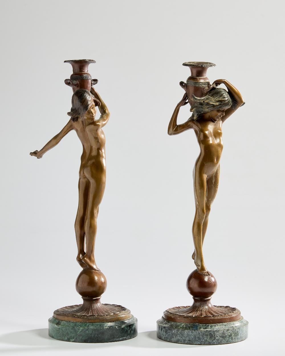 Edward McCartan comparable auction result: edward mccartan 1879 1947 pair of figural candlesticks 20th century