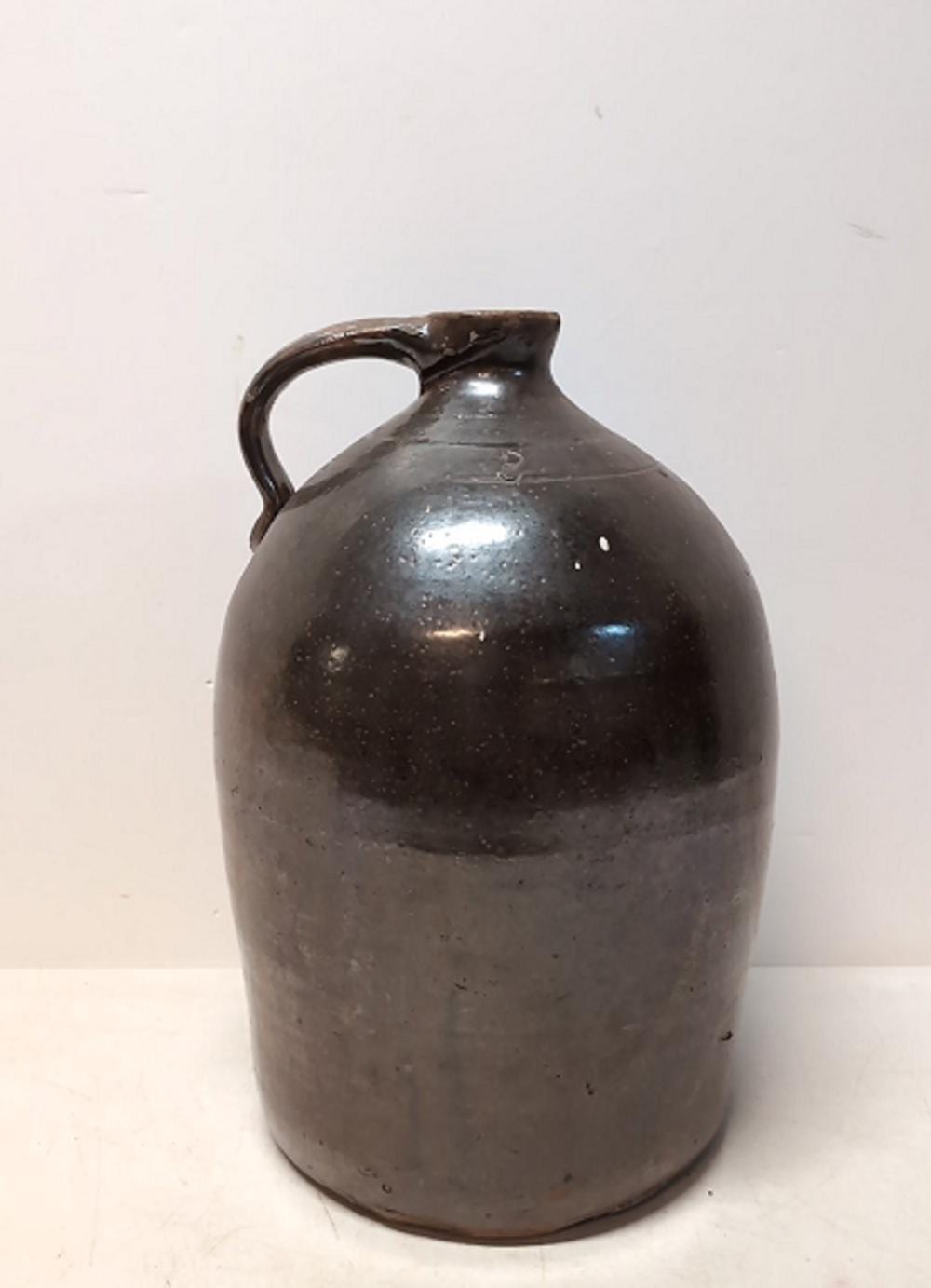 Antique 3 gallon stoneware crock jug sold by Heritage Antiques & Auction, lot 154 — auction record photograph