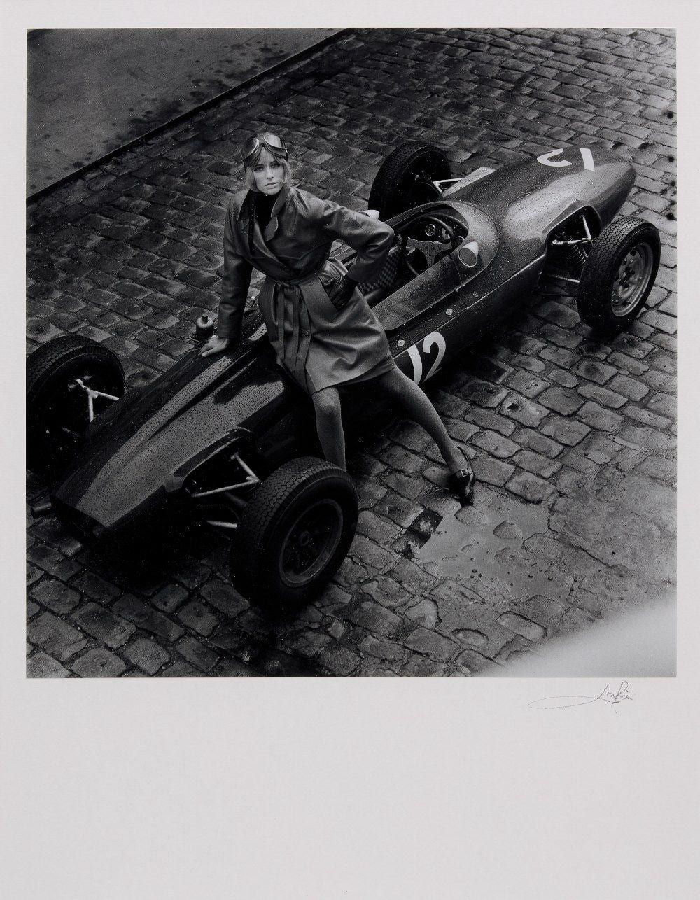 Patrick Lichfield comparable auction result: patrick lichfield jill kennington with a lotus formula one car 1964 probably printed later