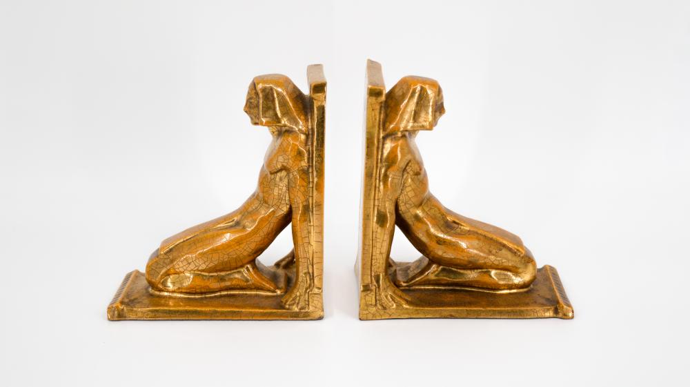 Emile Adolphe Monier comparable auction result: emile adolphe monier 1883 1970 french pair glazed ceramic bookends of kneeling egyptian figurines