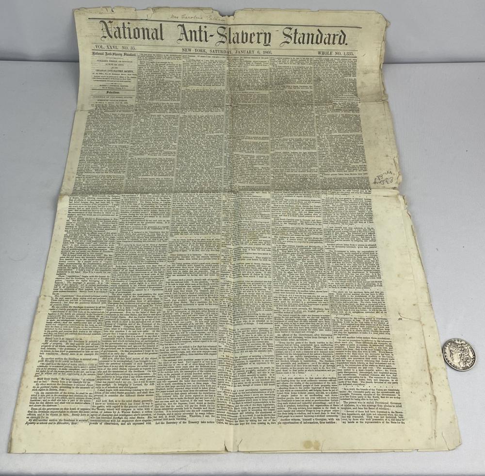Antique newspaper spread titled "National Anti-Slavery Standard" with multiple columns of black text and faded, aged paper edges.