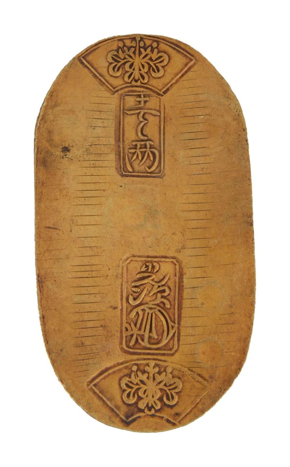 Single gold-toned coin-shaped token with embossed Japanese-style symbols and decorative corner emblems.
