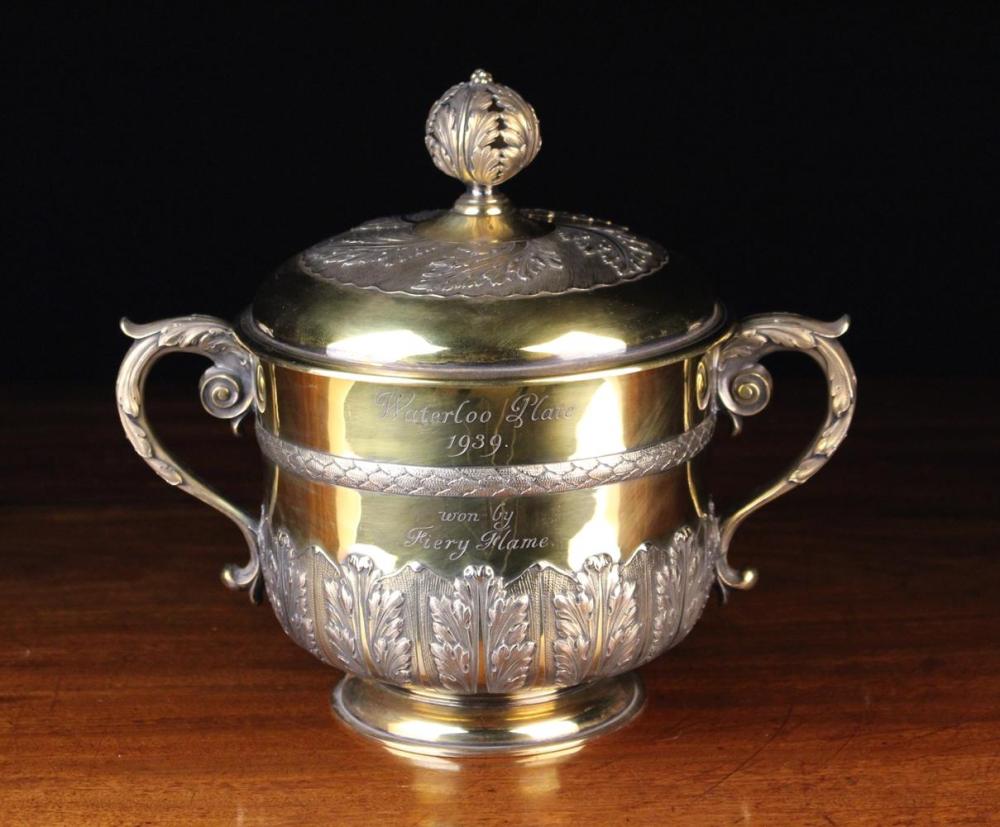 A Fine Quality Silver Gilt Twin-handled Hare Coursing Cup & Cover; a replica of a Charles II Caudle sold by Wilkinson's Auctioneers, lot 448 — auction record photograph