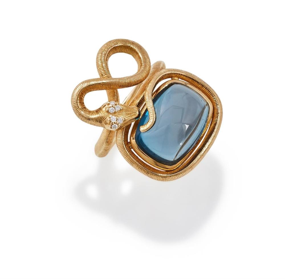 Ole Lynggaard comparable auction result: ole lynggaard a snakes ring petite diamond and blue topaz ring