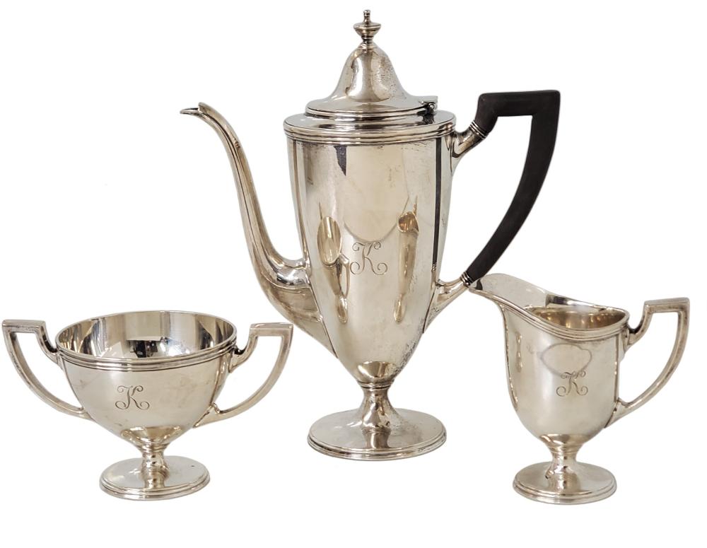Auction comp thumbnail for Tiffany & Co Hamilton Sterling Silver Tea Set Teapot Creamer Sugar 32.52ozt (Hess Fine Art, Lot 3843)