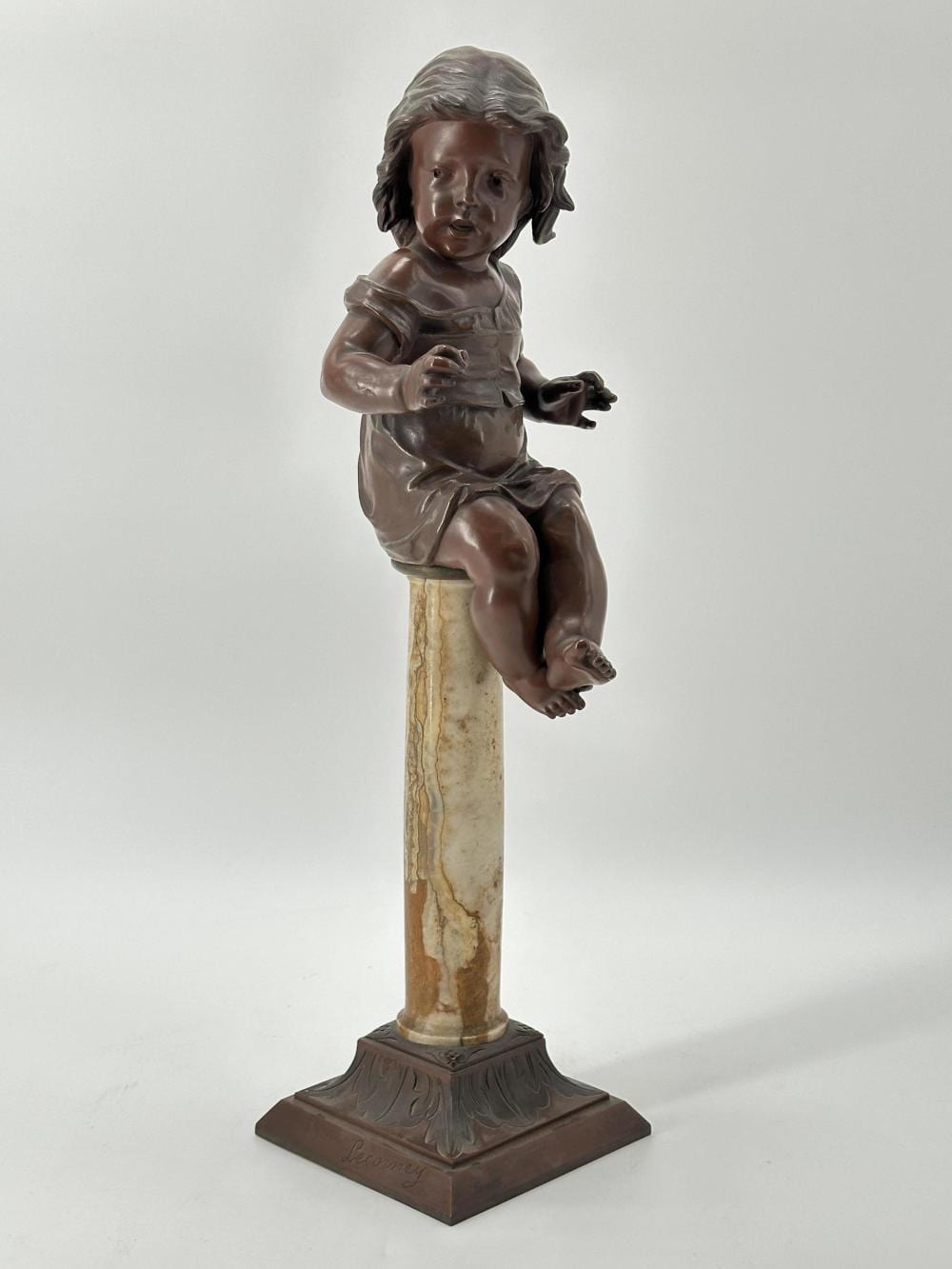 Nicolas Lecornet comparable auction result: nicolas lecornet act 1880 1884 jeune gar on assis sur une colonne bronze patine brune et onyx ht 56 cm