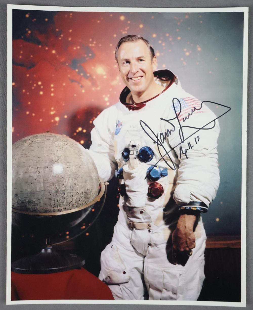 James Lovell comparable auction result: james lovell signed apollo 13 white space suit photograph