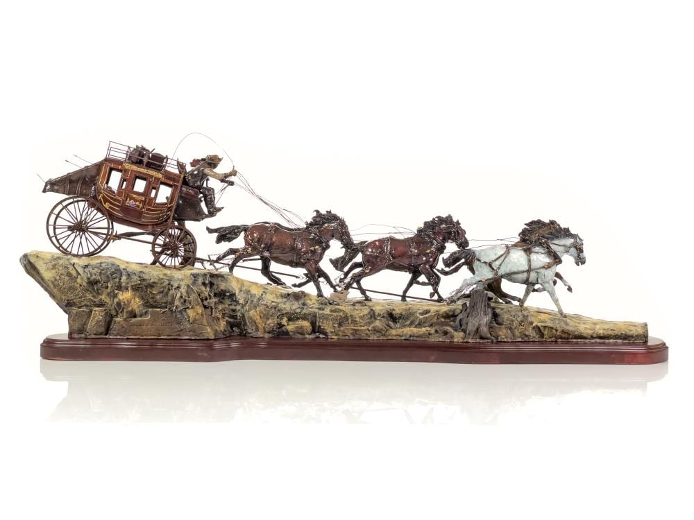 Laran Ghiglieri comparable auction result: large laran ghiglieri stagecoach gold bronze sculpture