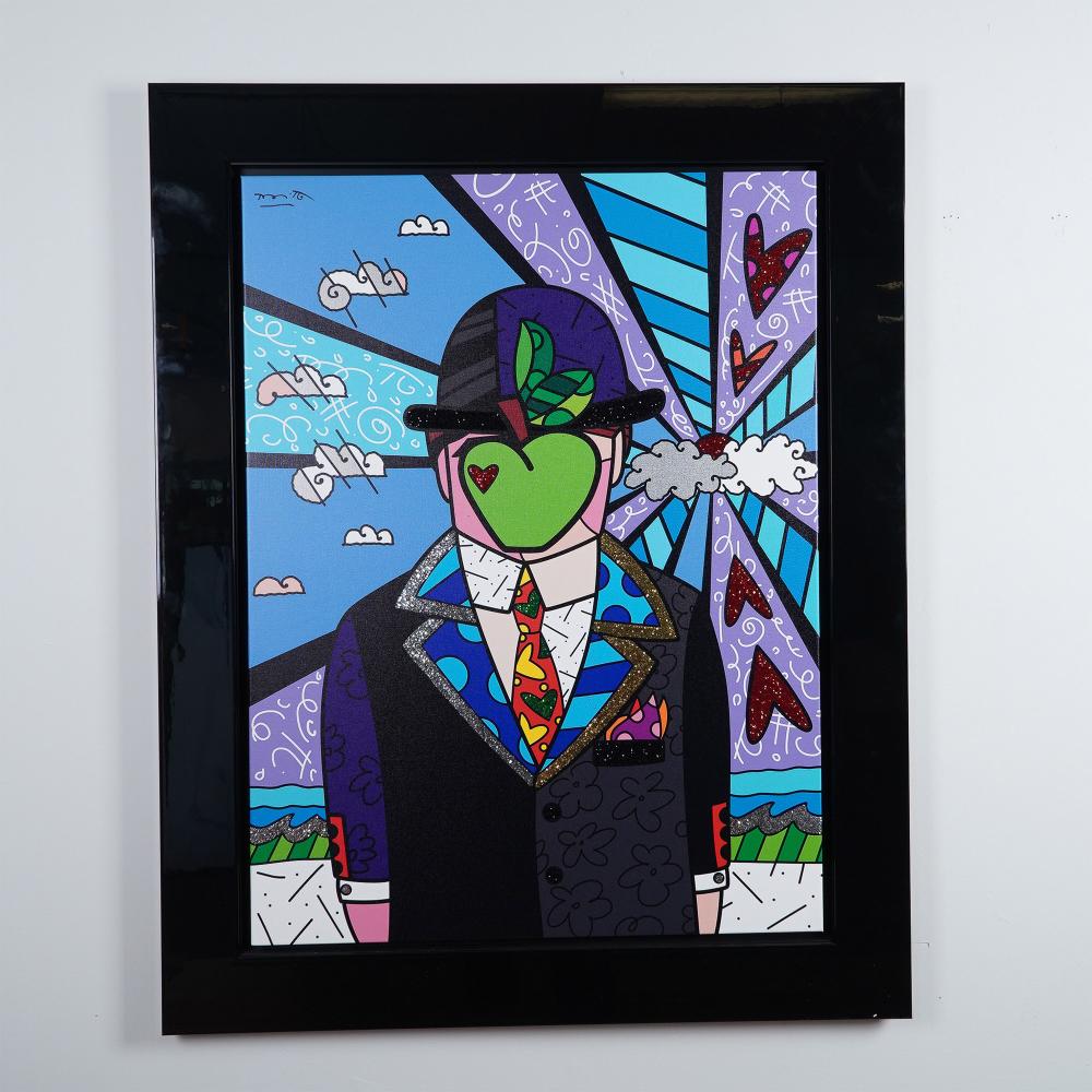 Framed colorful pop-art style print of a suited figure in a bowler hat with a green apple covering the face.
