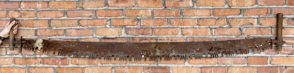 Antique Crosscut Logging Saw sold by Davis Brothers Auction, lot 999 — auction record photograph