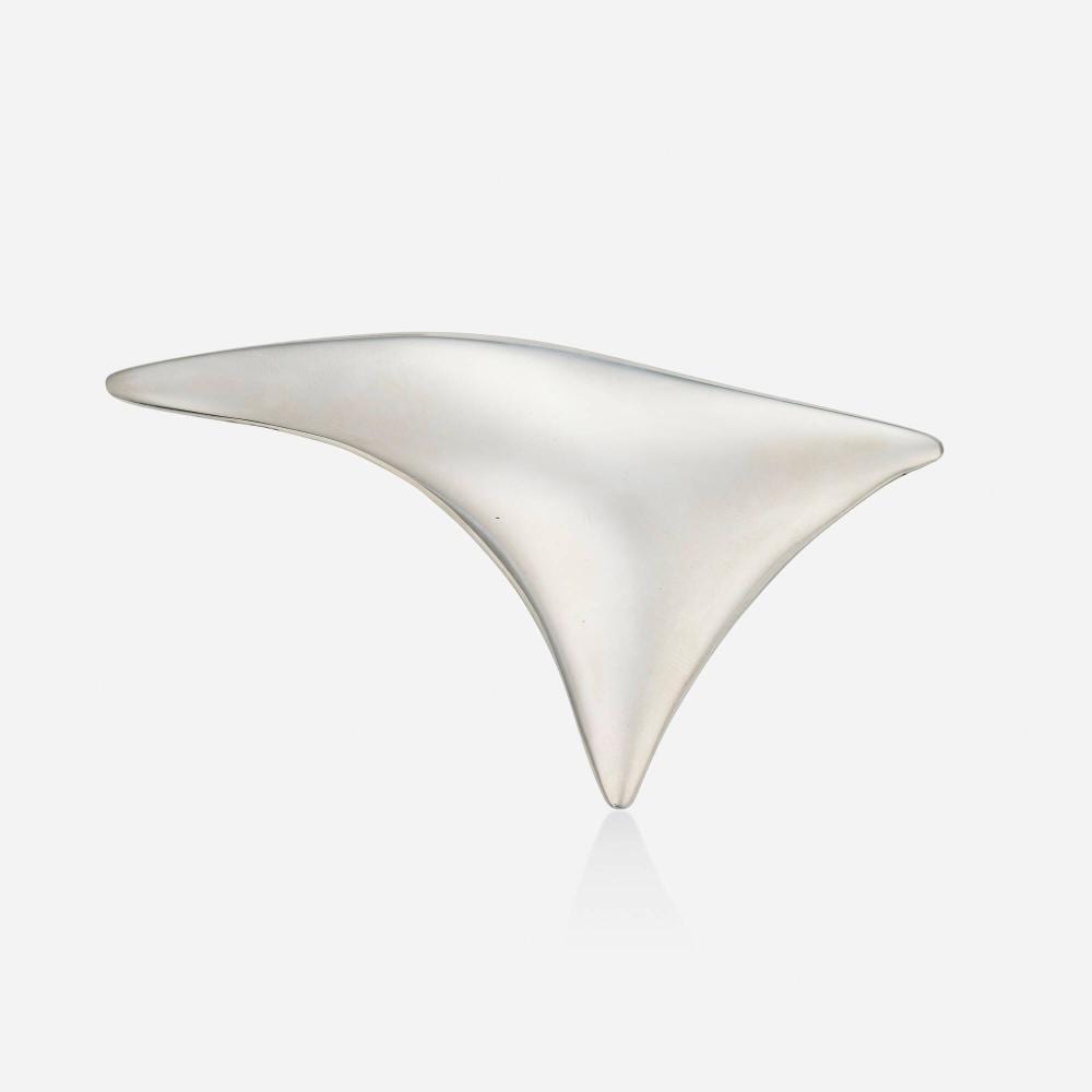 Jose De Rivera comparable auction result: jose de rivera stainless steel brooch