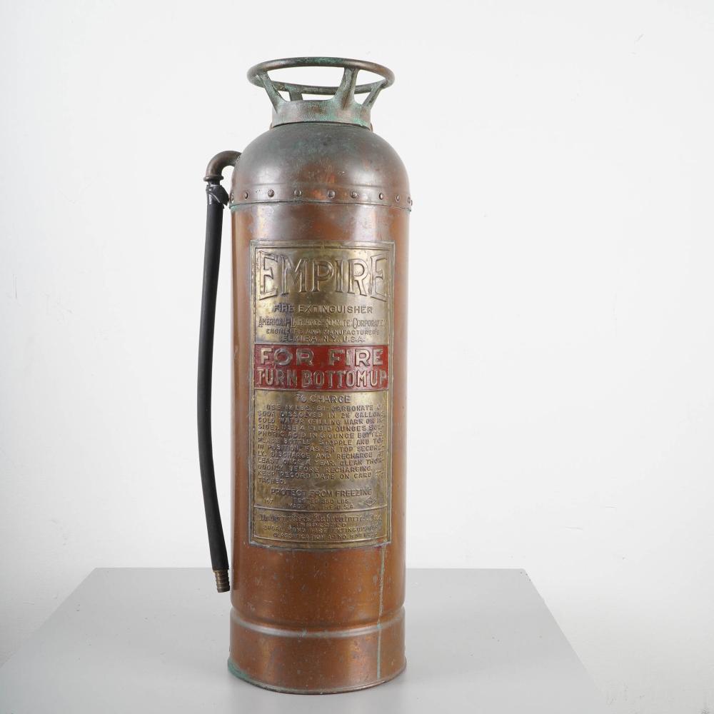 1920s Empire Copper and Brass Fire Extinguisher by American LaFrance sold by Lion and Unicorn, lot 34 — auction record photograph
