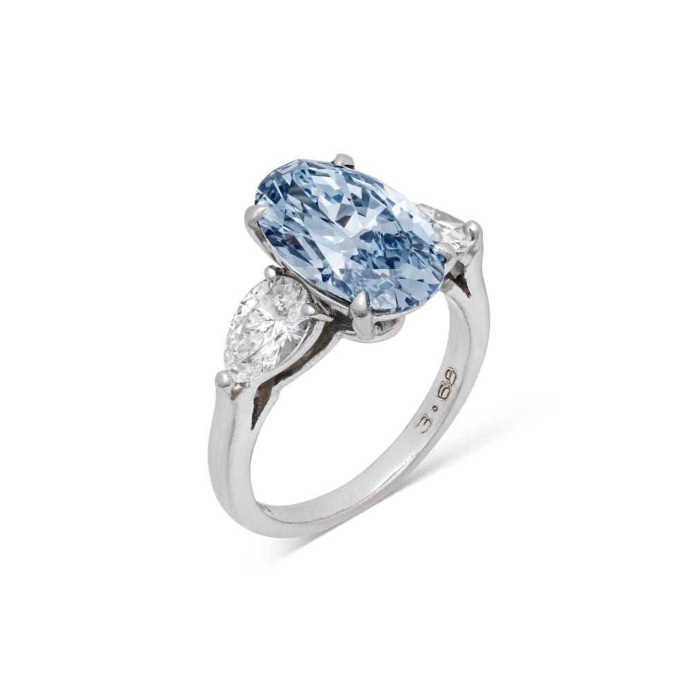 Rare Graff Coloured Diamond And Diamond RING. comparable sale