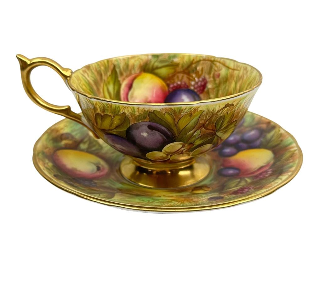 Aynsley Orchard Gold English China Tea Cup Saucer sold by MiddleManBrokers, lot 95 — auction record photograph
