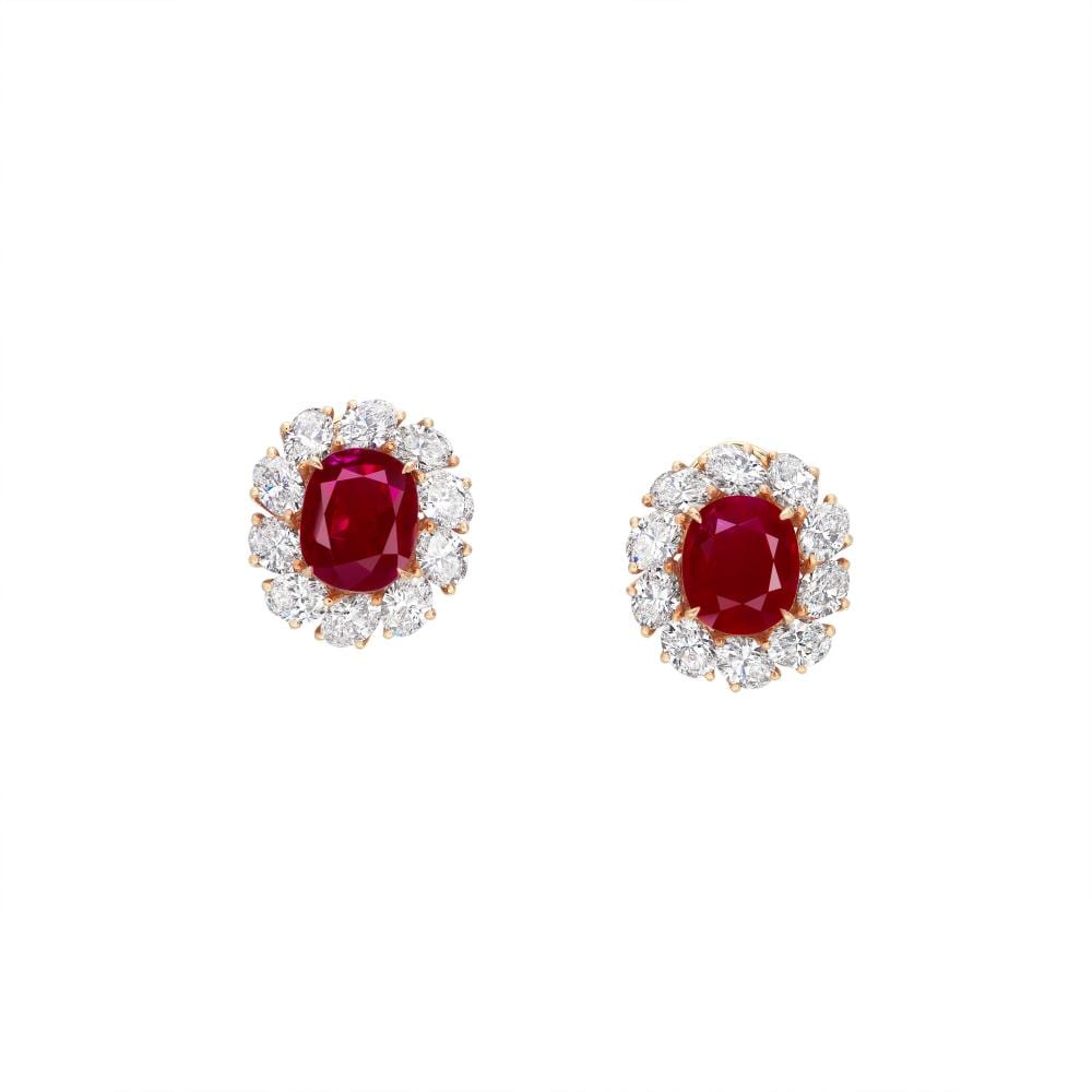 An Important Pair Of Ruby And DIAMOND EARRINGS. comparable sale