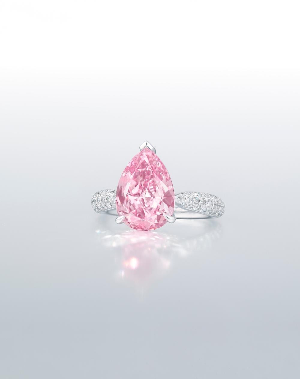 A Superb Coloured Diamond And Diamond RING. comparable sale