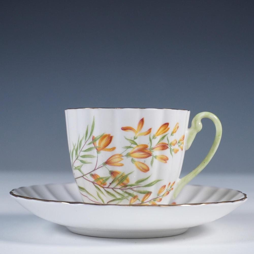 Shelley Fine Bone China Cup and Saucer in Floral Pattern sold by Lion and Unicorn, lot 147 — auction record photograph