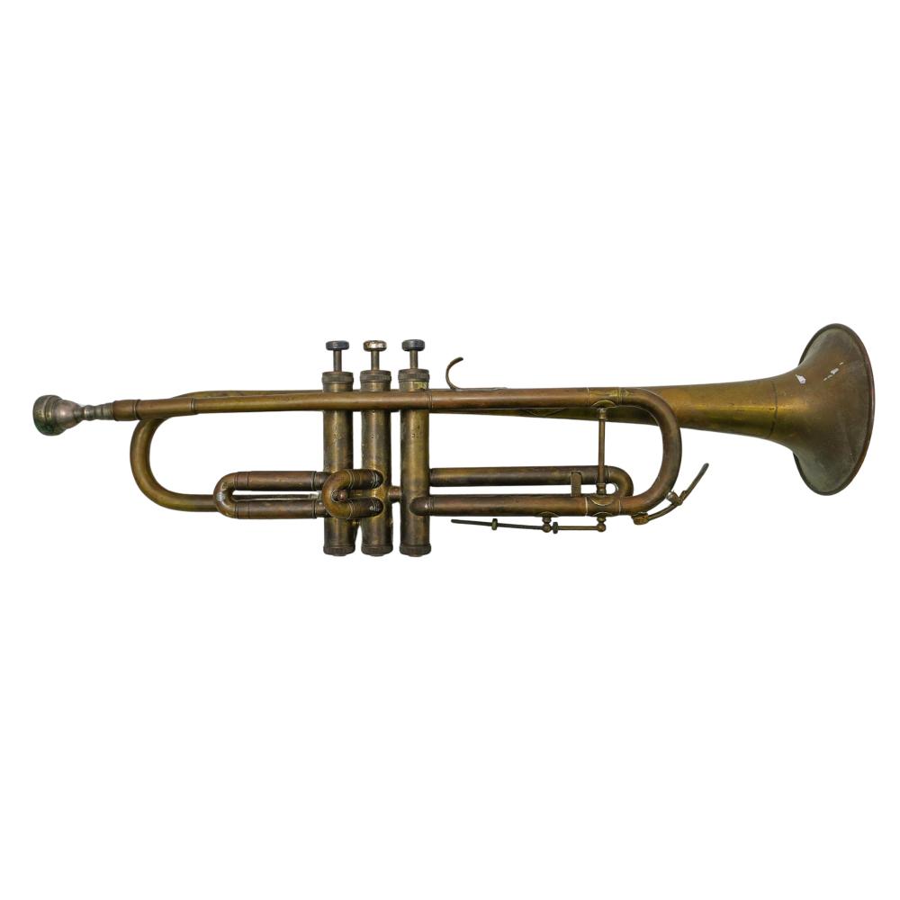 Antique brass trumpet with three piston valves, shown on a white background.