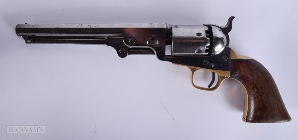Antique-style black and brown single-shot pistol with a wooden grip, shown in profile against a plain background.