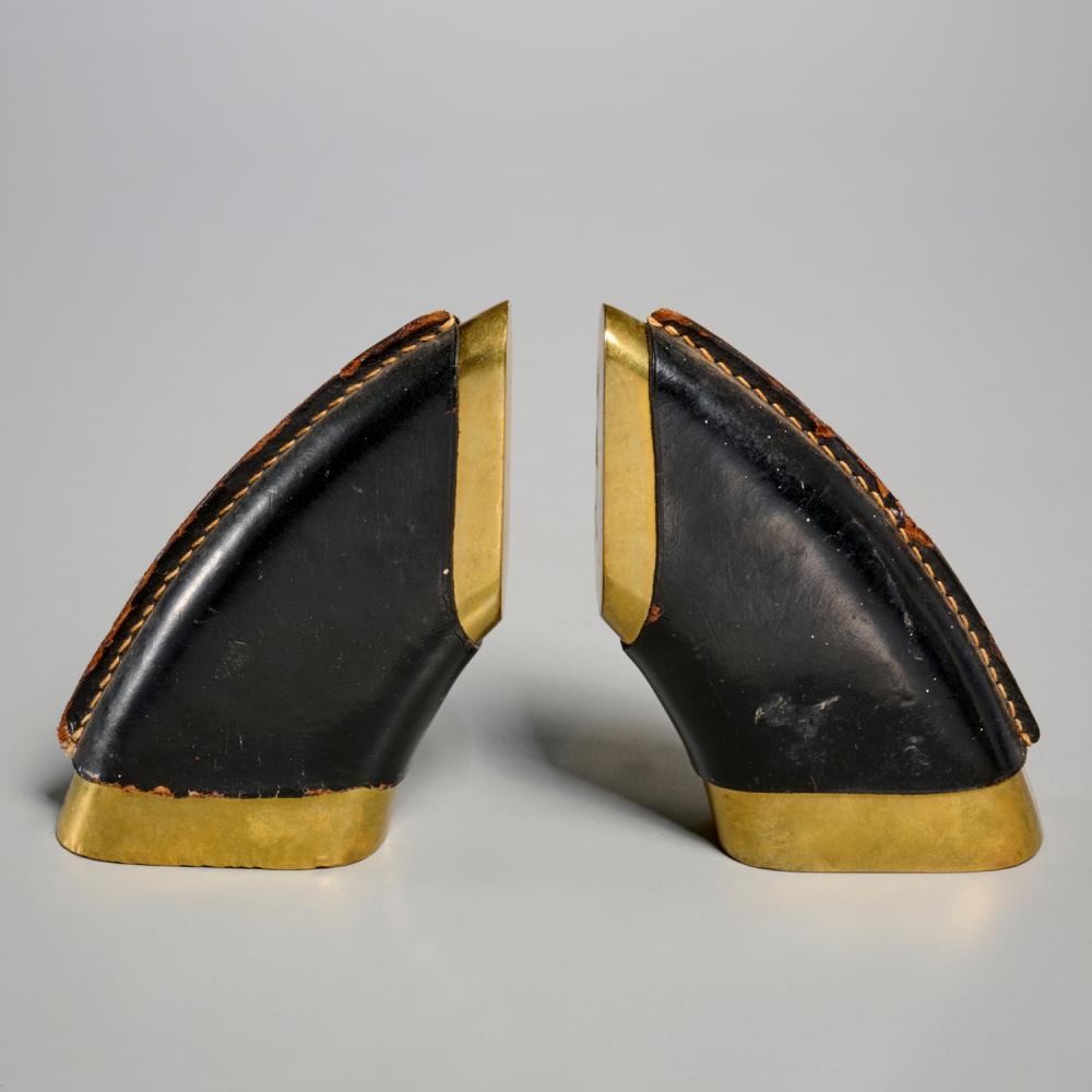 Carl Aubock comparable auction result: carl aubock leather and bronze bookends