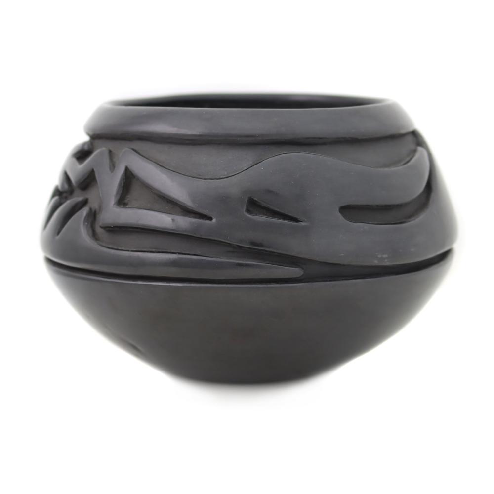 Teresita Naranjo comparable auction result: teresita naranjo 1919 1999 santa clara black bowl with carved avanyu design c 1970s 4 75 x 7