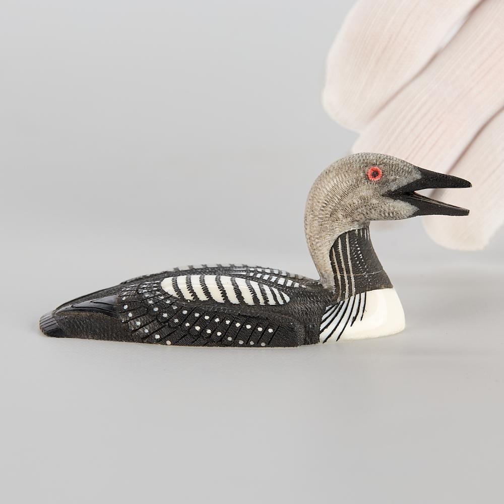 Larry Mayac comparable auction result: larry mayac arctic loon carving 1999