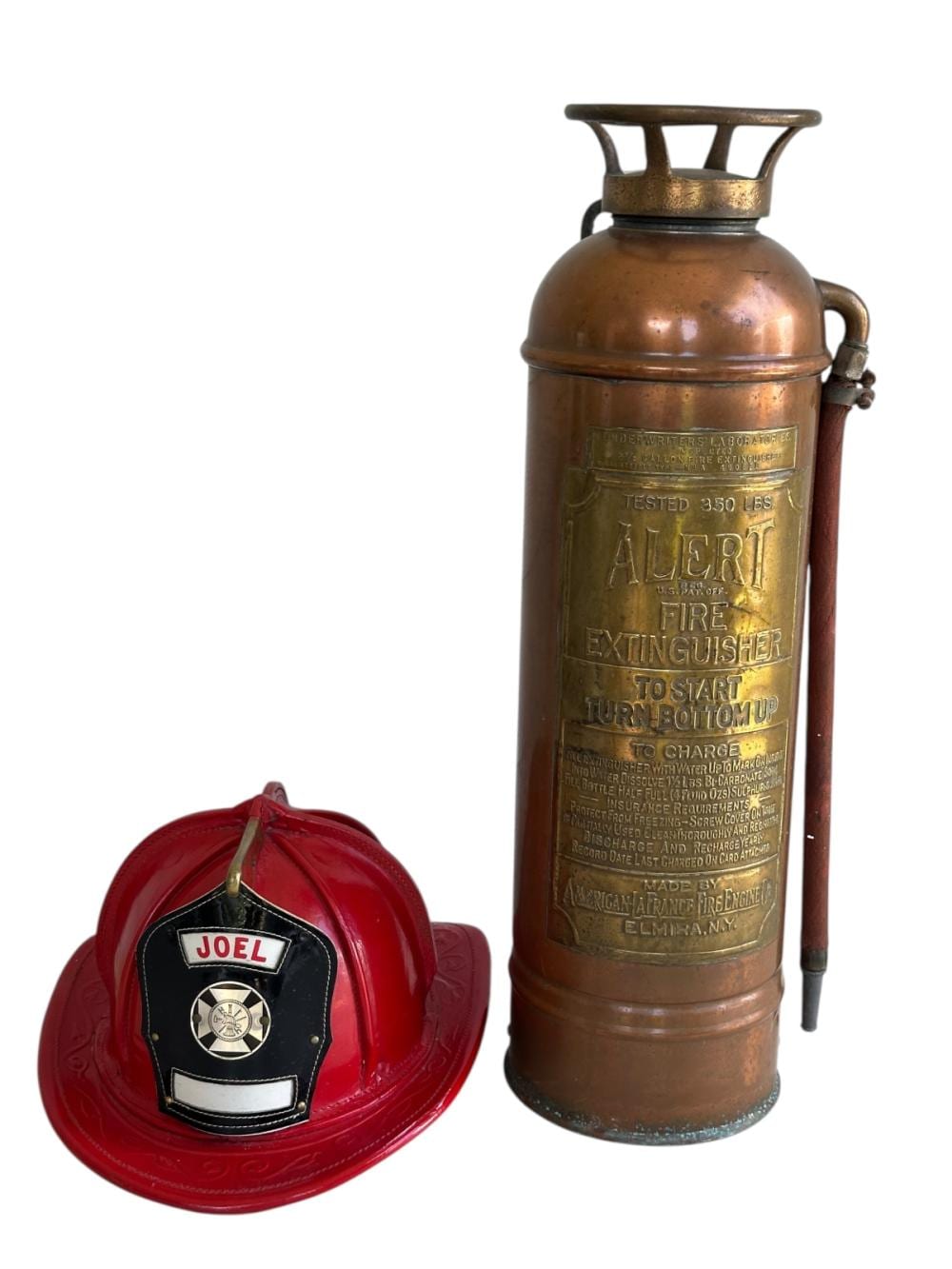 ANTQ FIRE EXTINGUISHER & LEATHER FIREMAN'S HAT sold by Neely Auction, lot 13 — auction record photograph