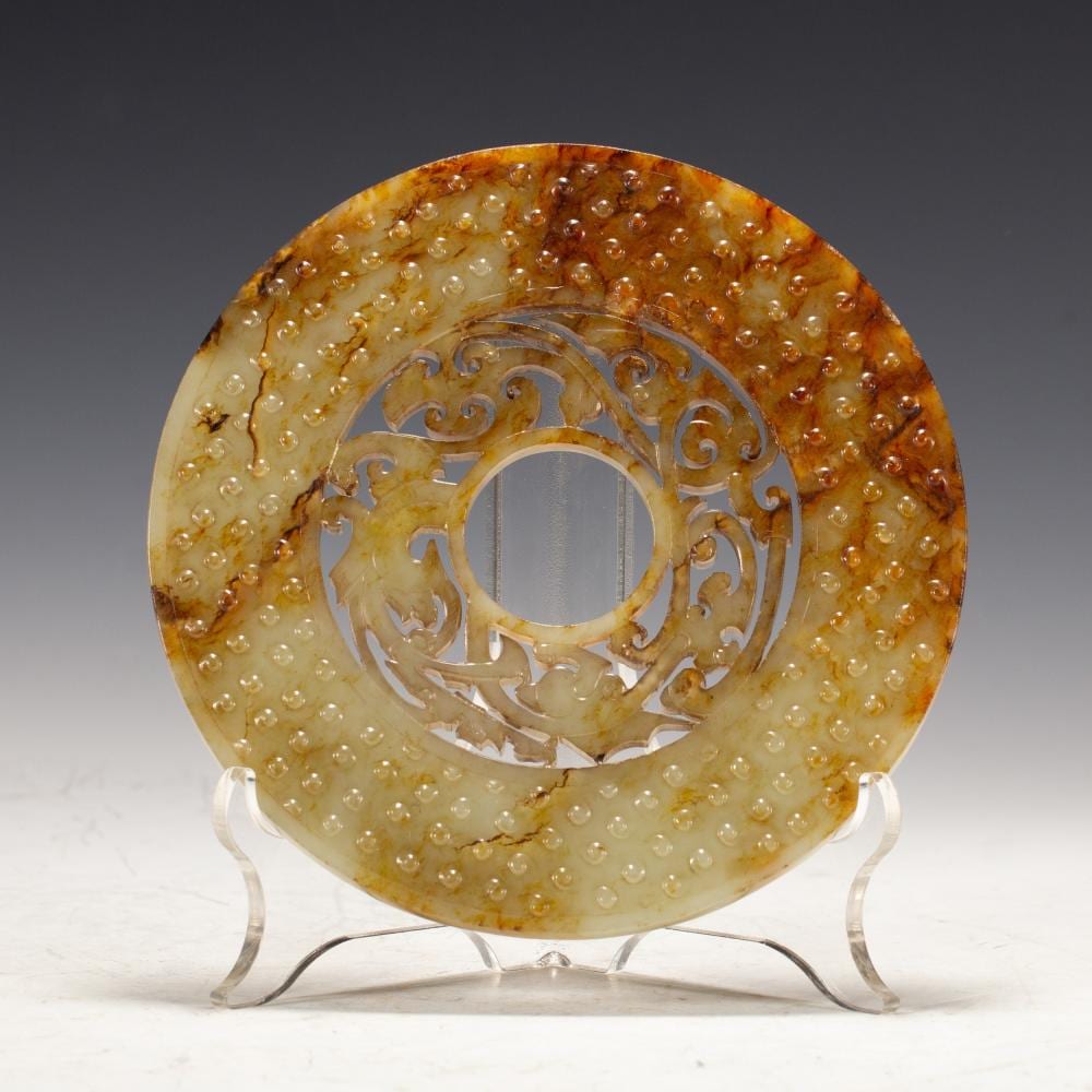 JADE BI WITH DRAGON PATTERNS AND COLOR INFILTRATION sold by Eden Fine Antiques Galleries LLC, lot 552 — auction record photograph