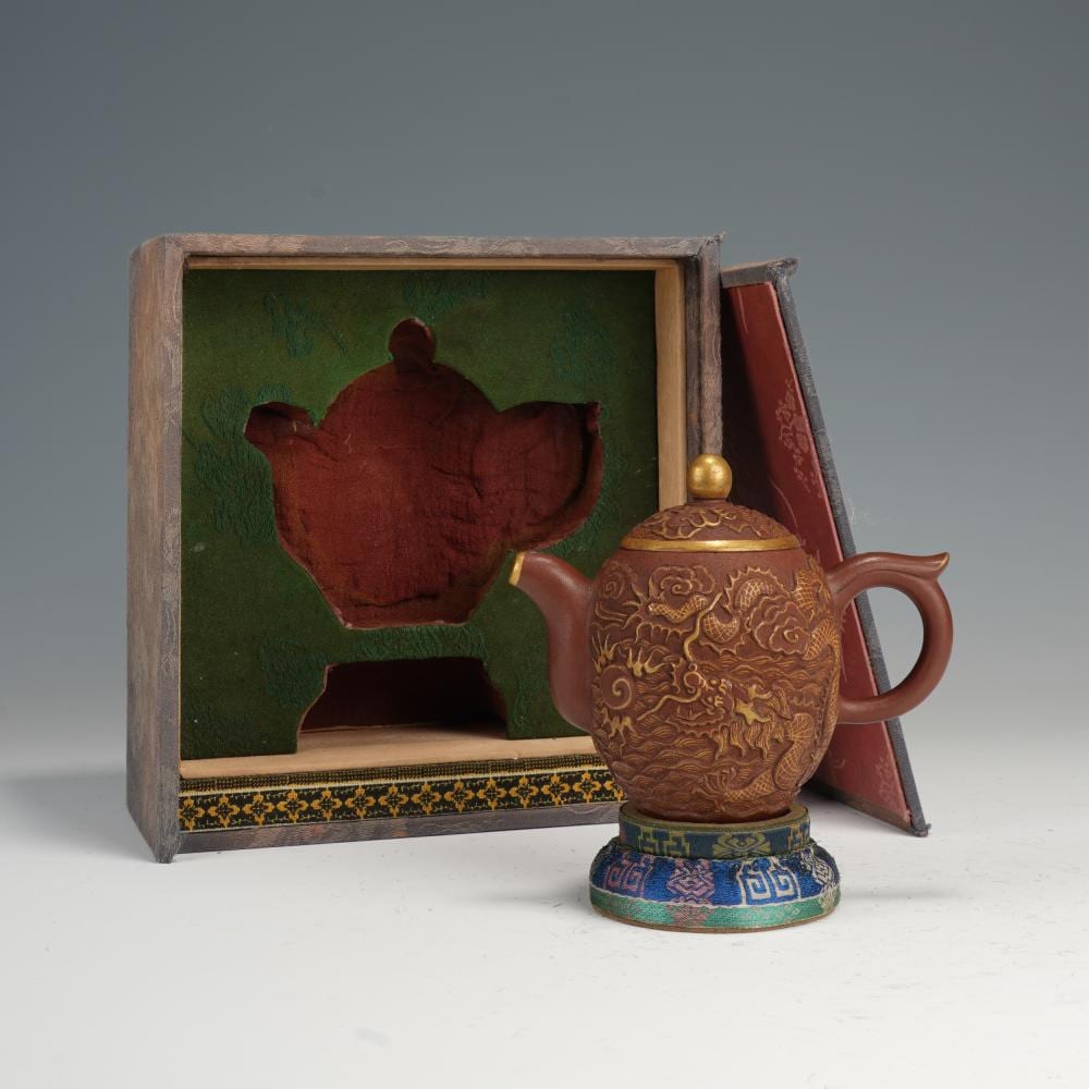 A PURPLE - SAND TEAPOT WITH DRAGON PATTERNS AND GOLD - TRACING sold by Eden Fine Antiques Galleries LLC, lot 59 — auction record photograph