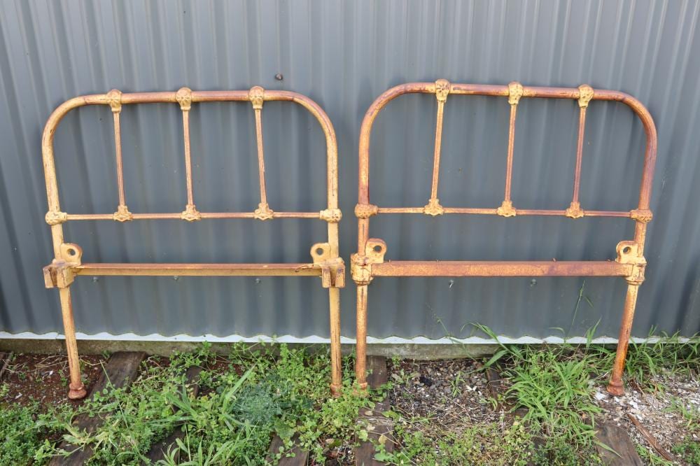 Pair of antique iron bed ends, approx 74cm W (2) sold by Vickers & Hoad, lot 852 — auction record photograph