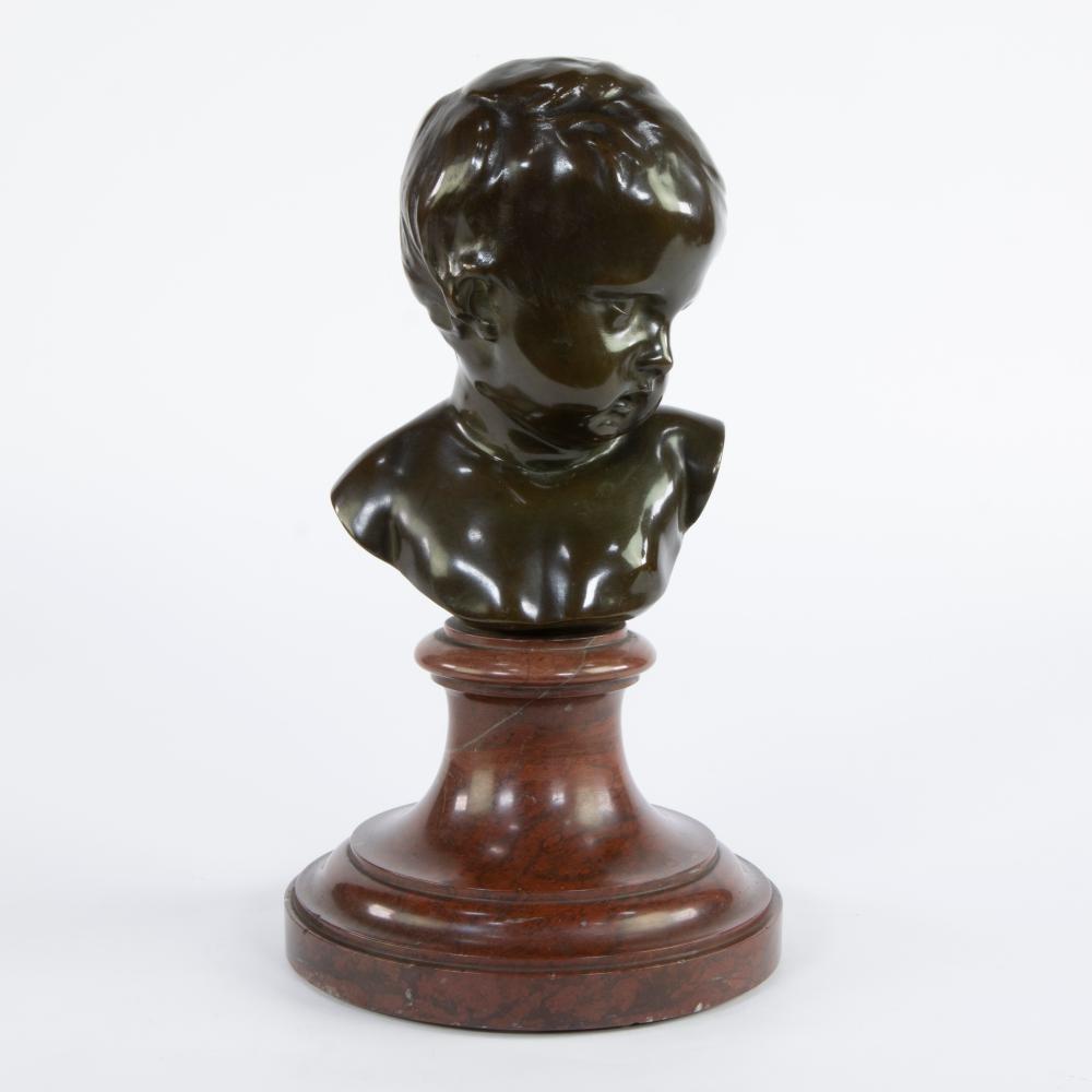 François DuQuesnoy comparable auction result: fran ois duquesnoy bronze child s head on marble base signed and marked foundry j petermann brussels posthumous