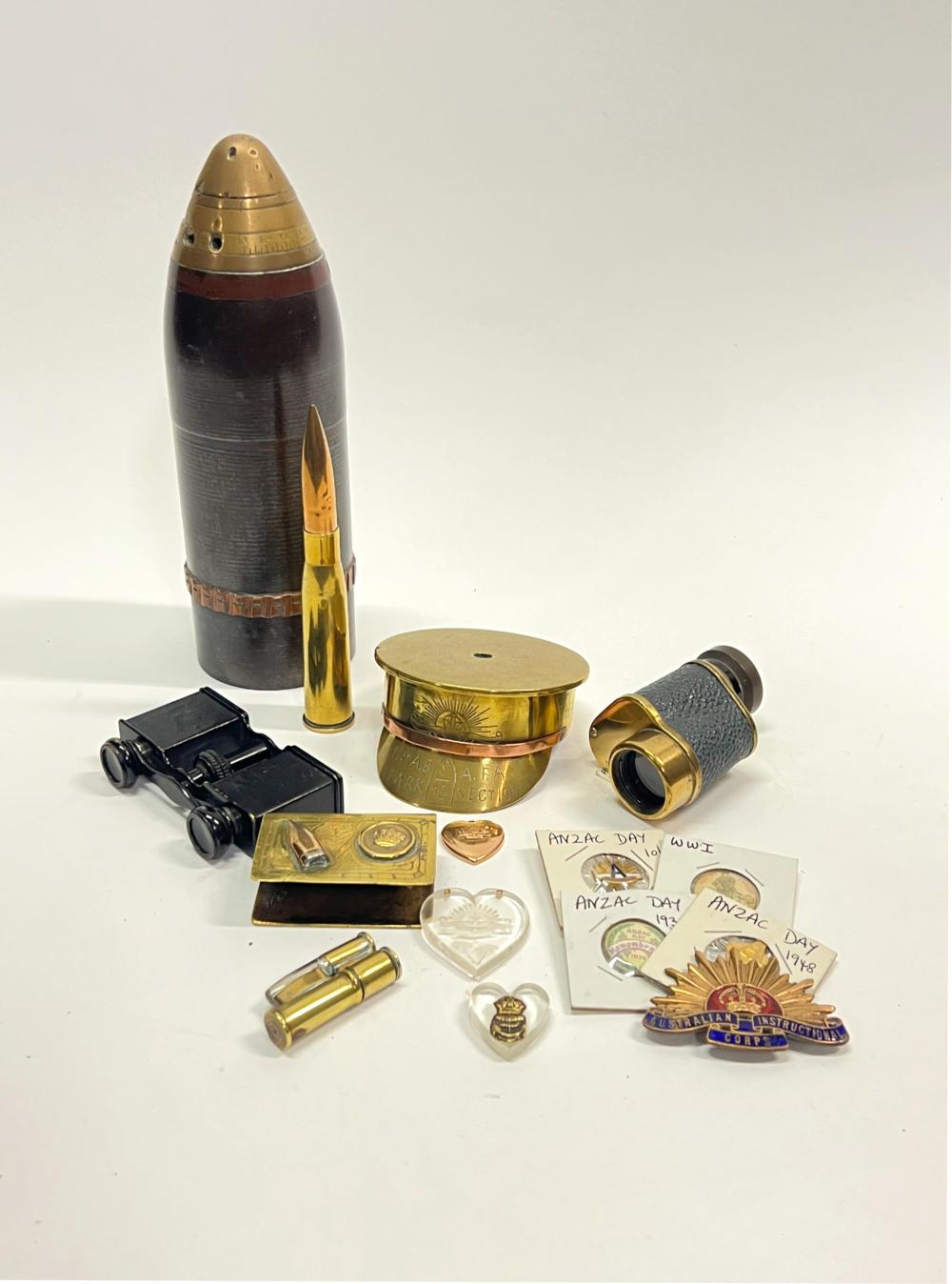 Auction comp thumbnail for A collection of WWI and WW2 military memorabilia including a 75mm Turkish shrapnel shell, French trench art, field glasses (Gibson's, Lot 65)