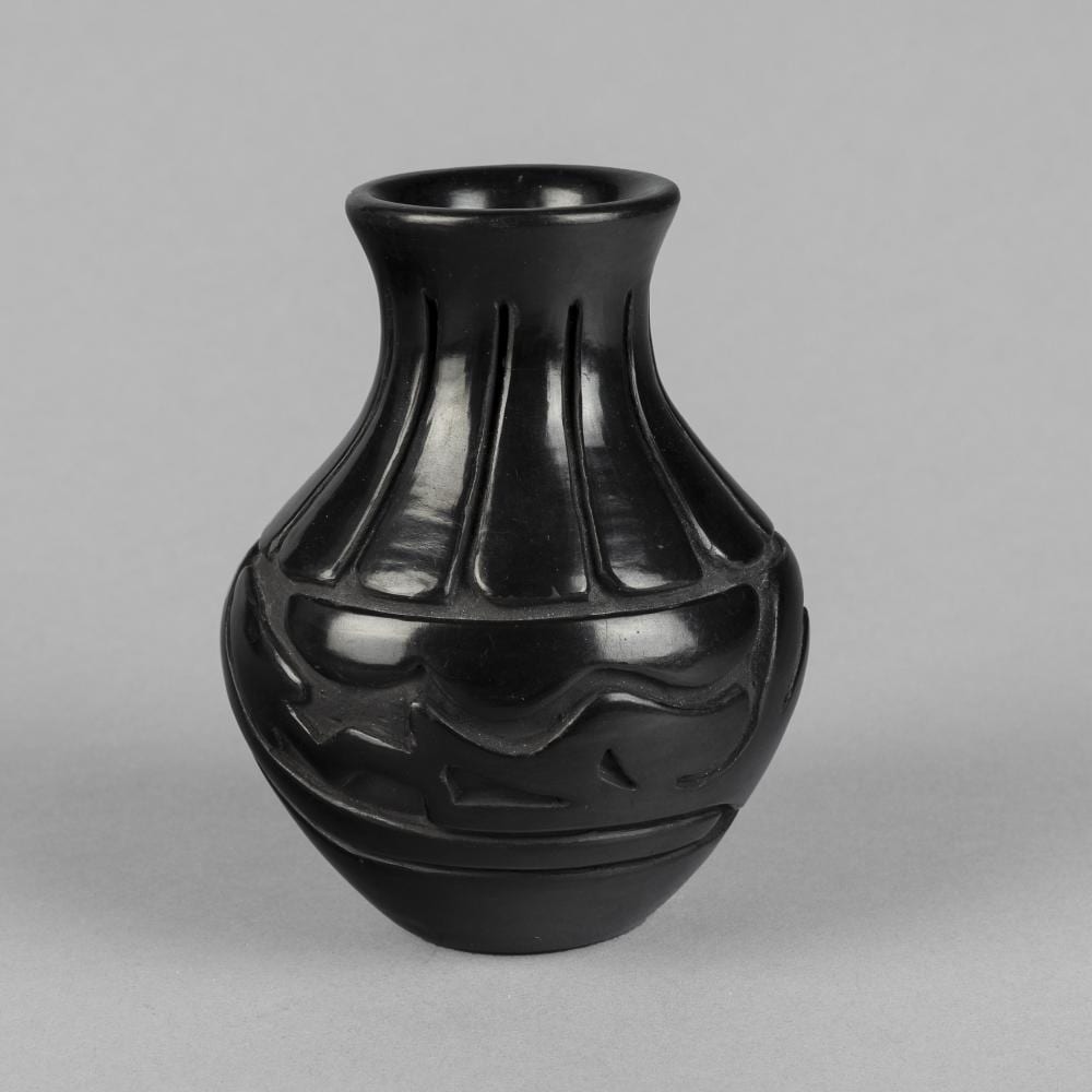 stella chavarria carved blackware pottery vase · Santa Fe Art Auction · 2025-06-18 Stella Chavarria comparable auction result: stella chavarria carved blackware pottery vase