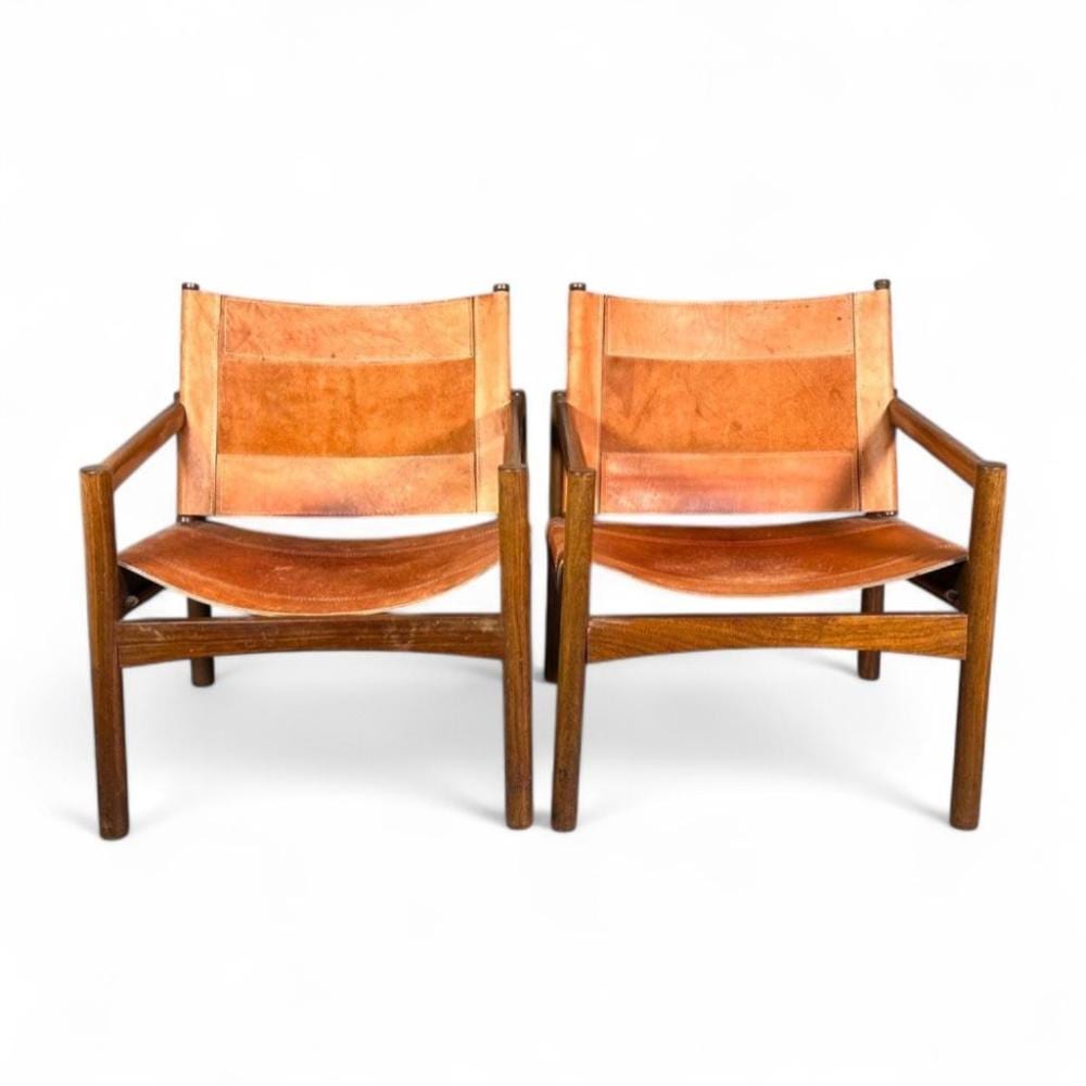Michel Arnoult comparable auction result: a pair of peg lev armchairs designed by michel arnoult