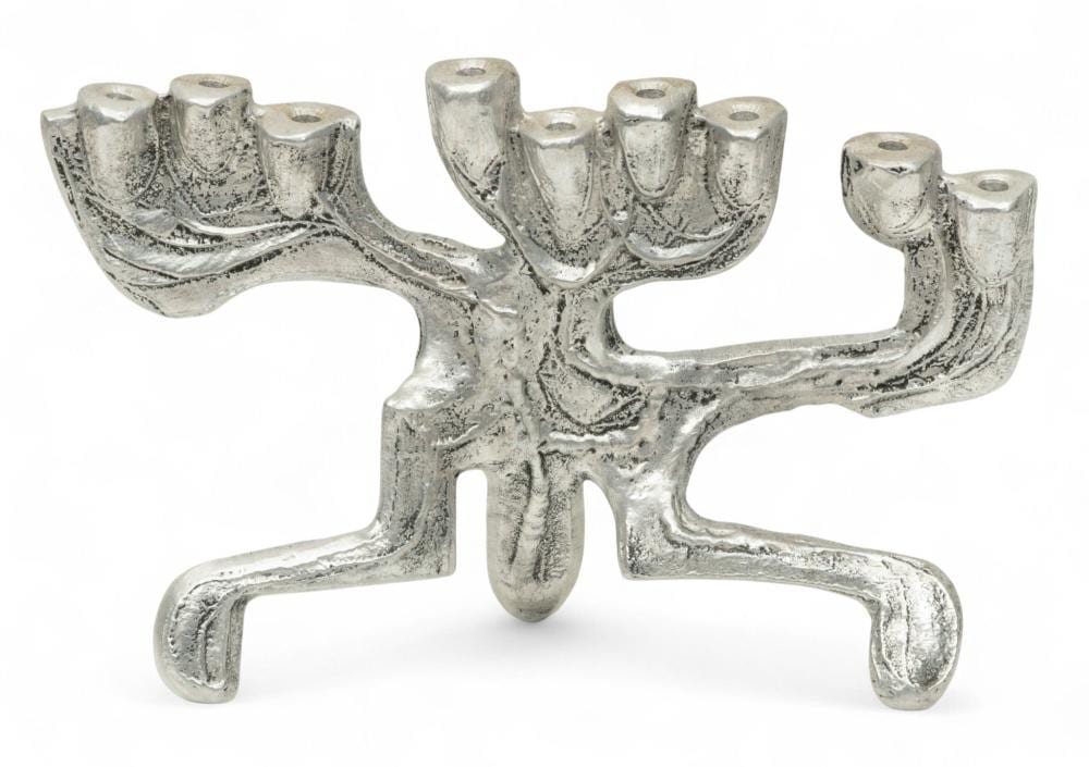 Don Drumm comparable auction result: don drumm american brutalist aluminum menorah h 10 25 l 15 5