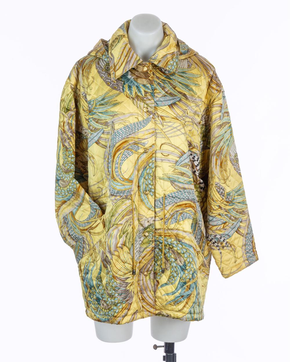 SALVATORE FERRAGAMO Vintage silk quilted jacket in yellow with feather and leaf motifs, detachable hood, made in Italy, size M sold by Lawsons, lot 85 — auction record photograph