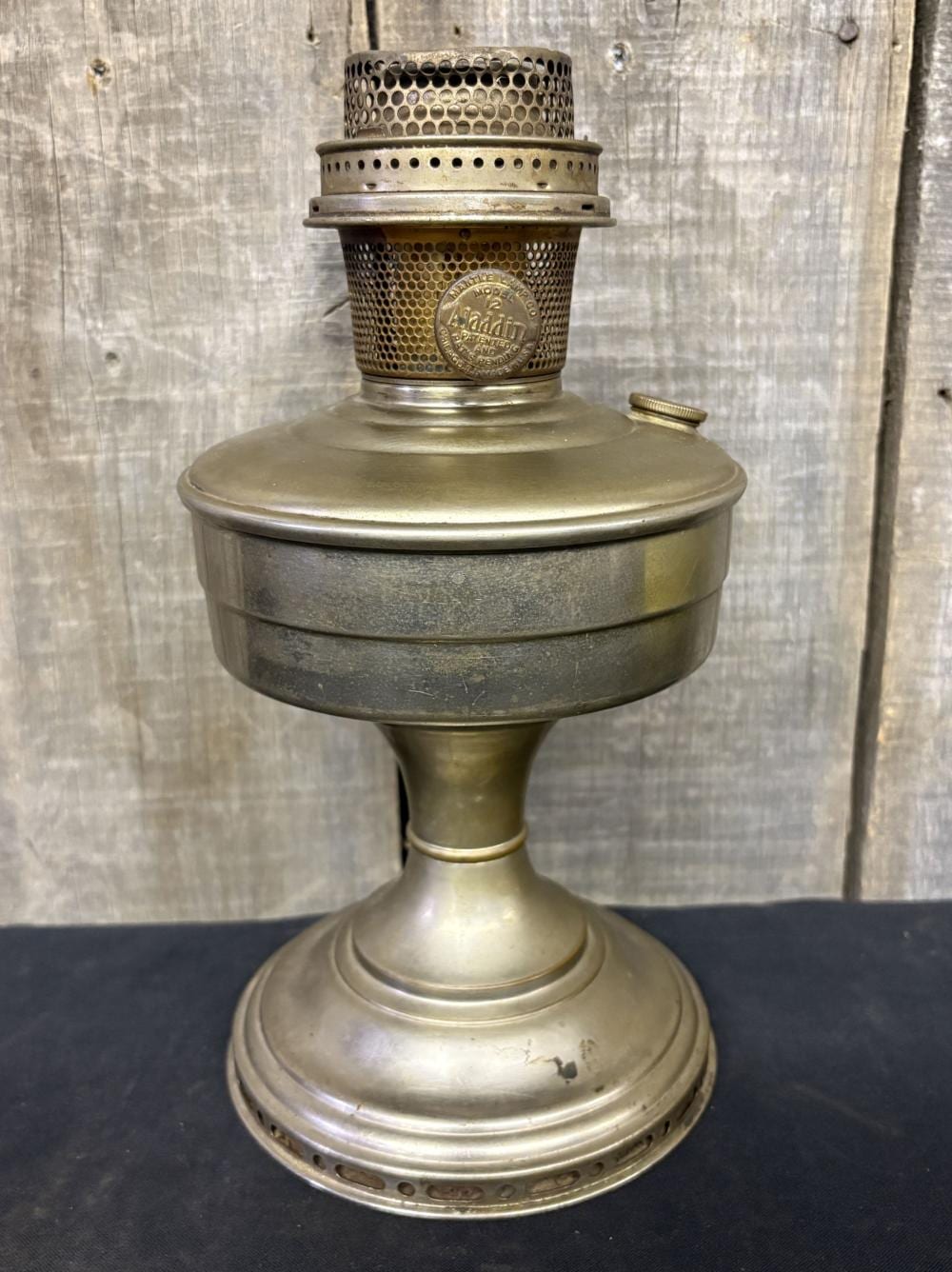 Early Aladdin Oil Lamp Model 12 6"X12" sold by Swisher Bros. Auction, lot 135 — auction record photograph