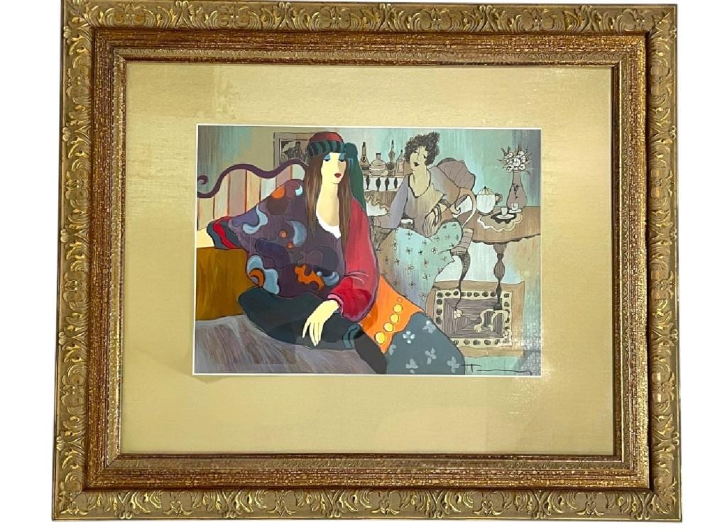 Framed colorful serigraph print depicting a seated woman in a red dress and a background tea service scene with people at a table.