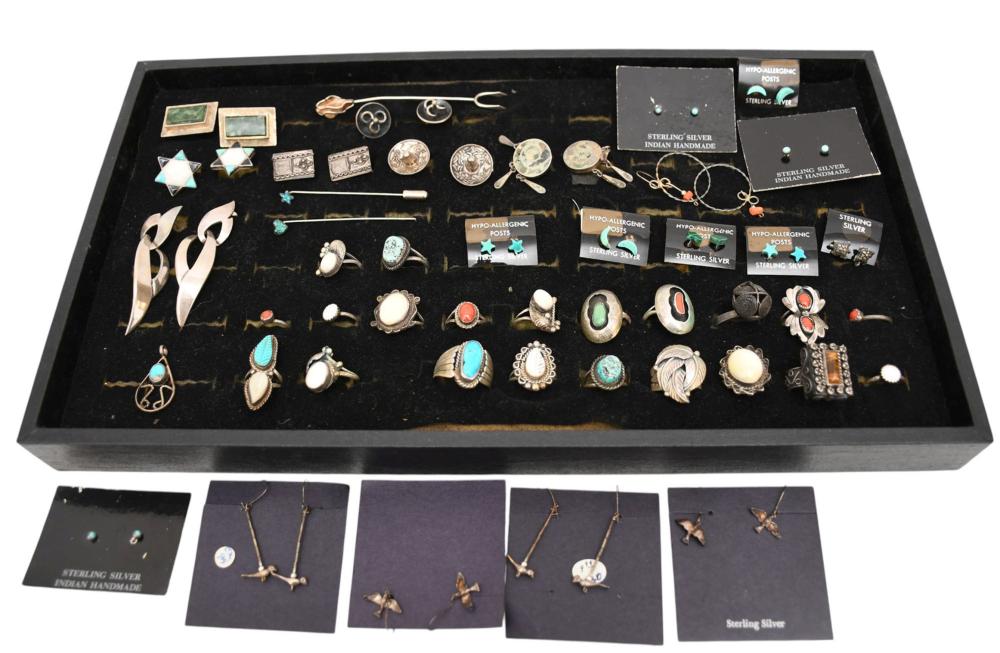 Sterling Silver Jewelry Lot. Rings size 3 - 8.25, Earrings, Cufflinks and pins. Old pawn rings some signed. Wt. 189.3 grams sold by Bill Hood & Sons Arts & Antiques Auctions, lot 424 — auction record photograph