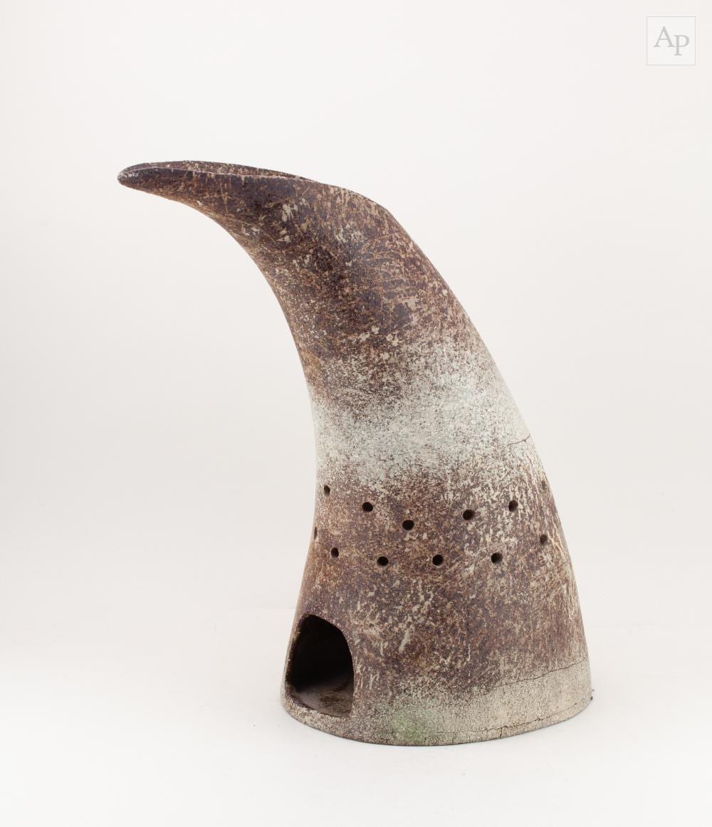 Abdo Nagi comparable auction result: abdo nagi 1941 2001 a large sculptural horn shaped candleholder made of t material and covered in a textured mottled cream glaze with iron staining height 47 5cm